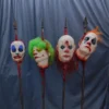 Dapper Cadaver Workshop Clown Heads On Spikes 4 Pc Pack Scary Clown Props & Circus Decor